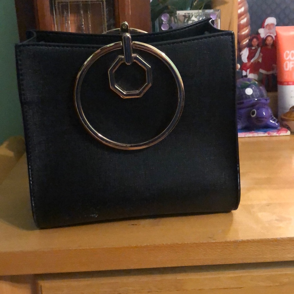 Black purse with gold details